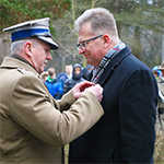 moment dekoracji prof. dr. hab. Mariusza Wołosa